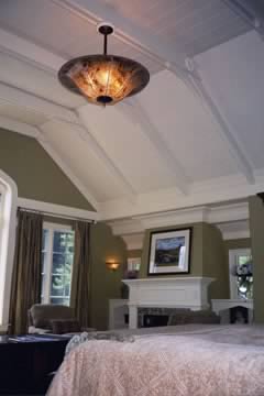 Mica ceiling and wall lighting in the master bedroom with custom hand-cut designs.